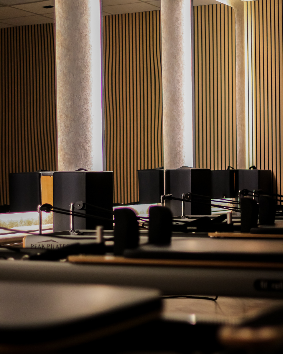 An interior space with fitness equipment set up