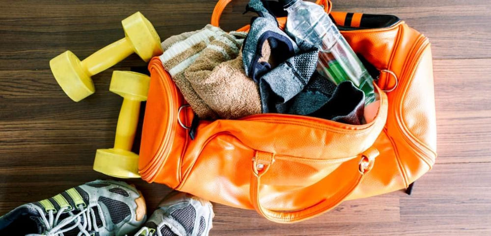 A Man's Gym Bag  Top Tips For Your Gym Bag Essentials - Sportswear, Shoes  & Snacks