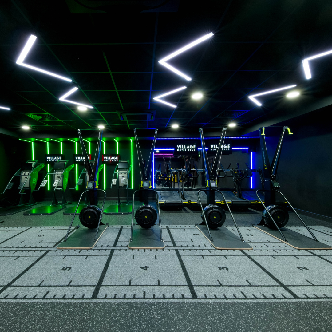 An interior space with fitness equipment set up