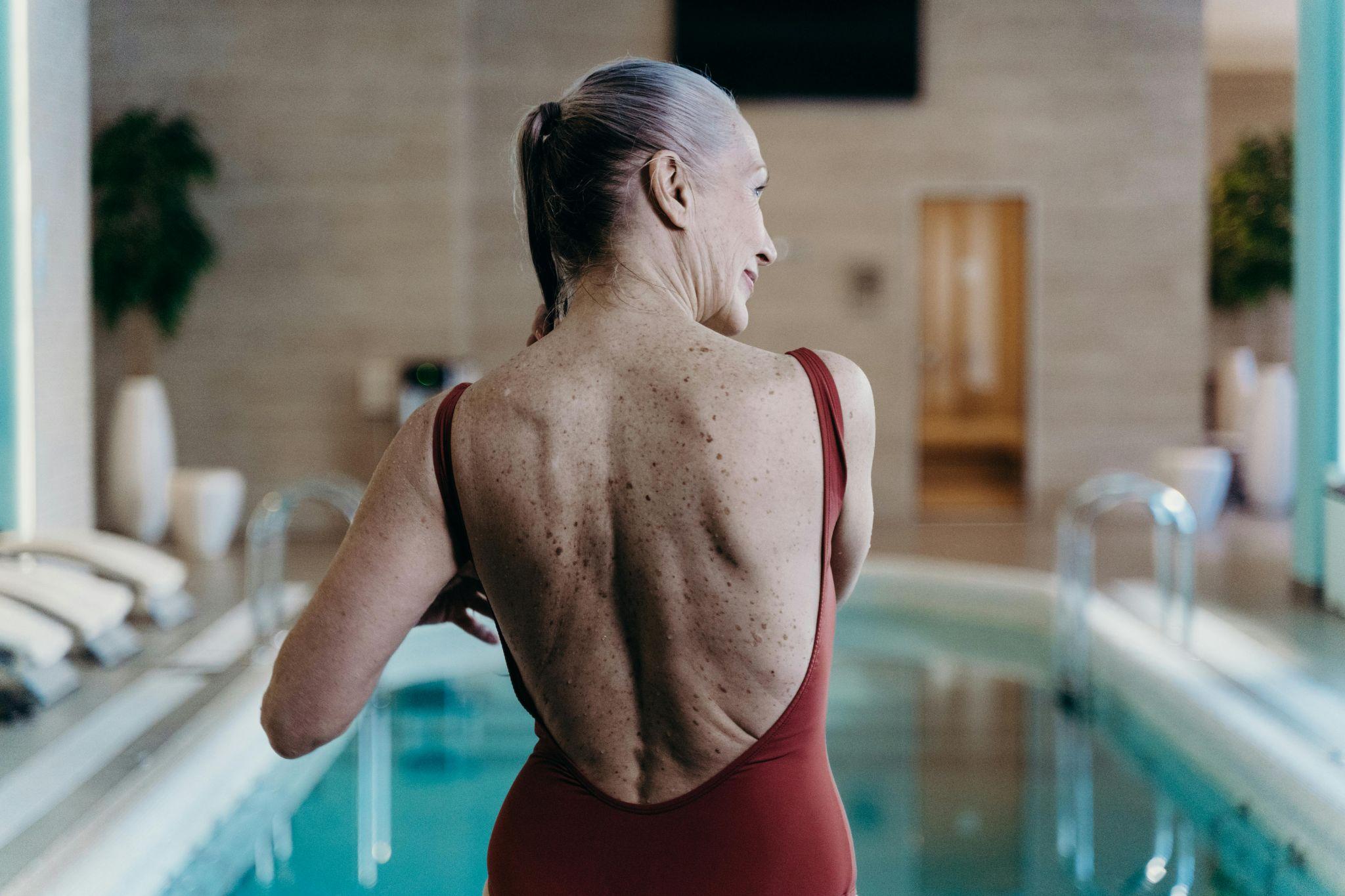 Senior woman at swimming pool