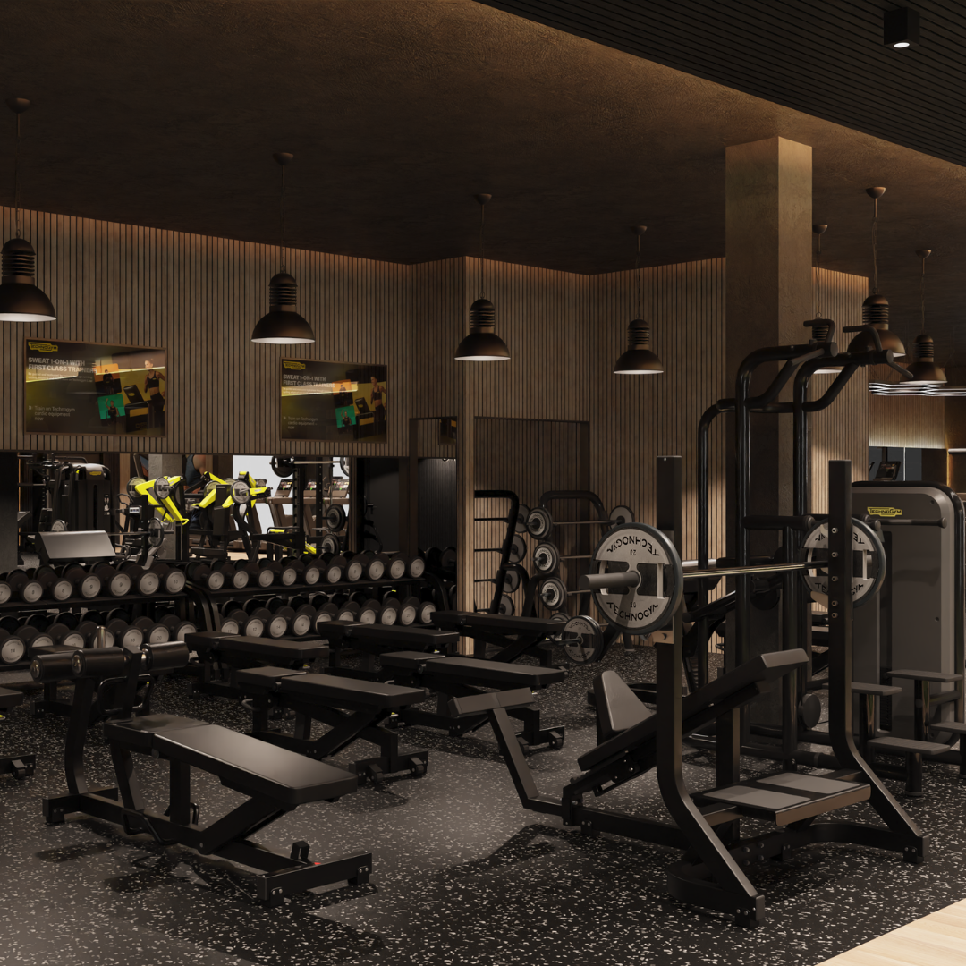 A gym room featuring various weights and exercise machines arranged for workout sessions.